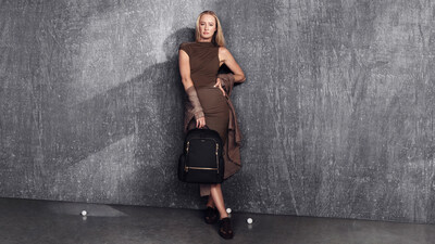 Nelly Korda pictured with the Voyageur Celina Backpack in Black/Gold. (PRNewsFoto/Tumi, Inc.)
